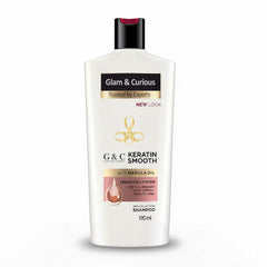 Glam & Curious keratin hair shampoo bottle with label, showcasing a smooth, healthy hair care product for frizz control and shine.