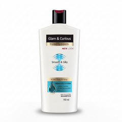 Glam & Curious Smooth & Silky Shampoo bottle with sleek packaging, designed for shiny, silky hair.